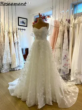 Снимка на сватбени рокли трапецовидна форма с открити рамене, 3D цветя, дантелен сватбени рокли в стил бохо стил кънтри.
